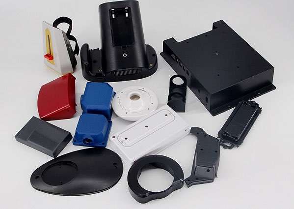 What materials are commonly used in plastic parts processing?